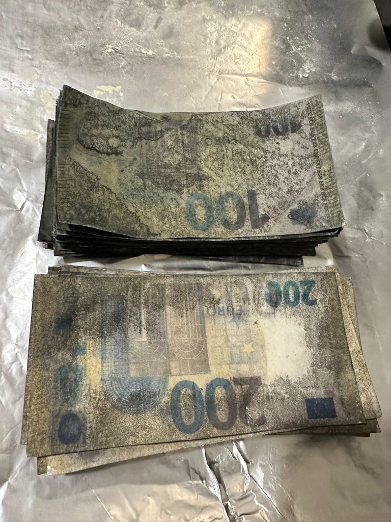 Decoding Coated Banknotes Safely